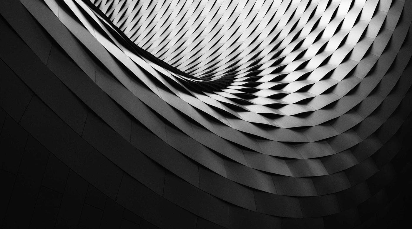 Curved metal louvres on a building facade