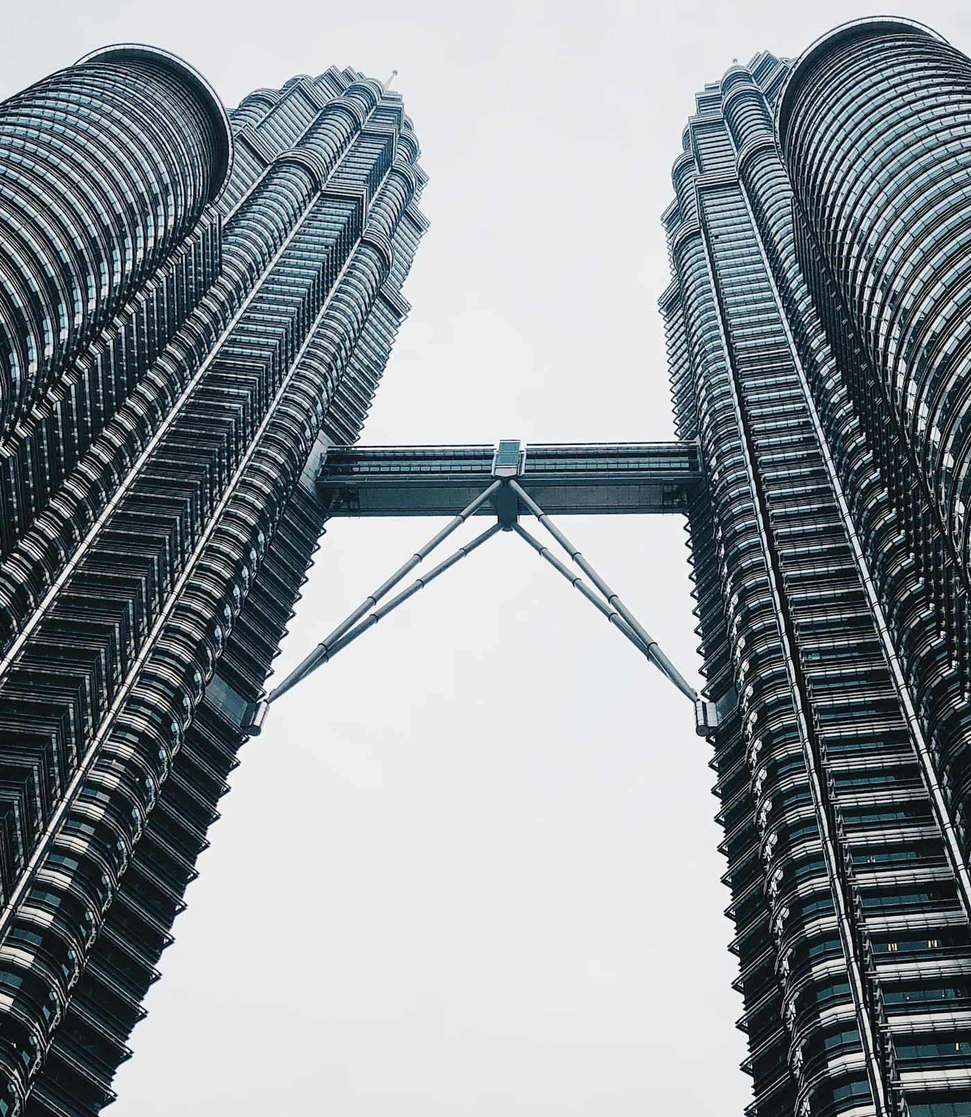 The braced steel skybridge linking the Petronas Twin Towers in Kuala Lumpur, seen from below